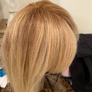 Hand blended wig.  Half human hair half synthetic. Medium shag blonde